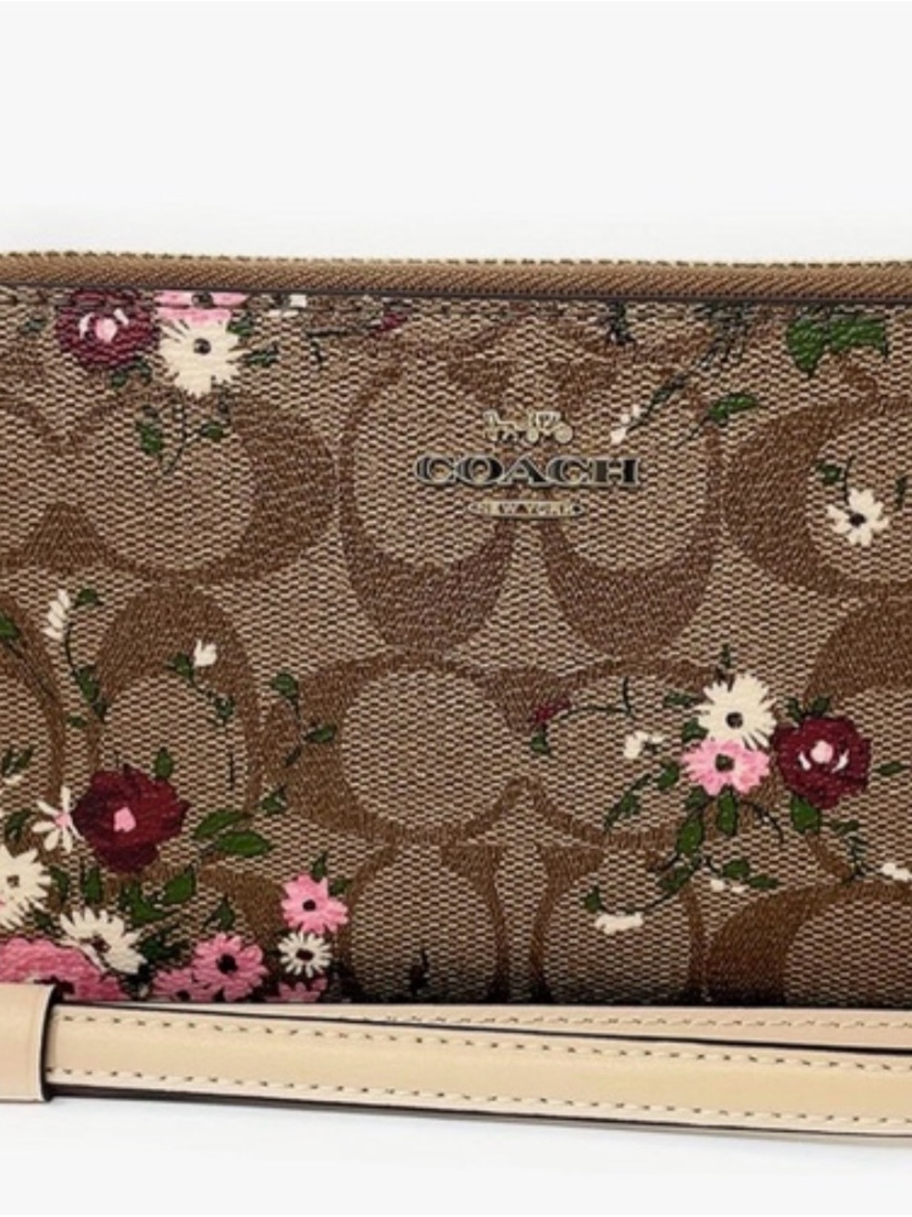 COACH Brown Signature Floral Wristlet with Cream Strap